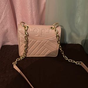 Tory Burch small pink purse, in excellent condition.